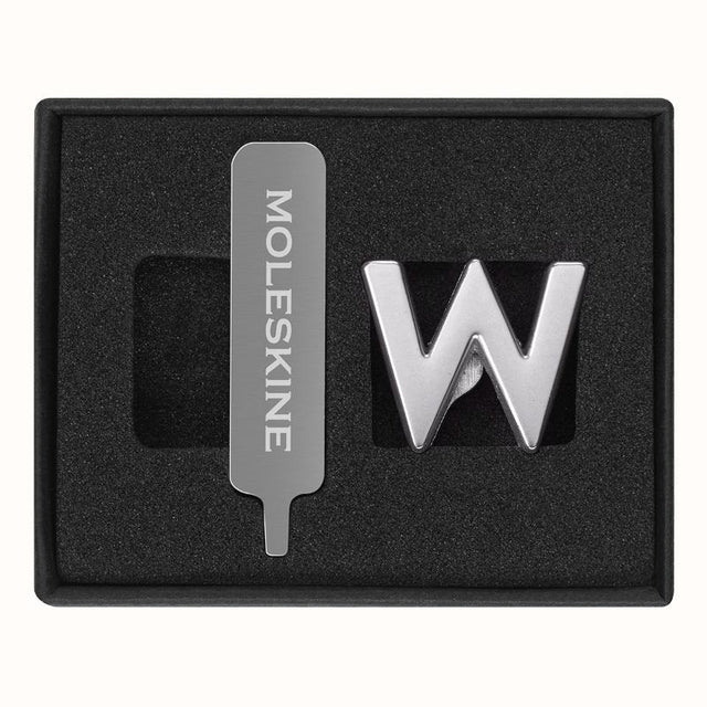 Stylish Moleskine Pins W Silver crafted from zinc alloy for personalizing notebooks with initials or inspiring words.