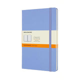 Moleskine Large Ruled Notebook in Hydrangea Blue, featuring a hard cover, ivory pages, elastic closure, and expandable inner pocket.