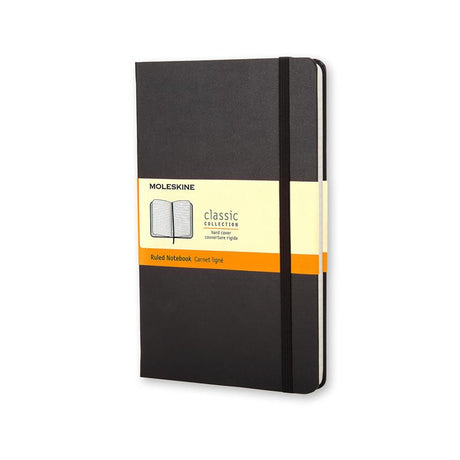 Large black Moleskine notebook with hard cover, ruled ivory pages, elastic closure, and expandable pocket for notes.