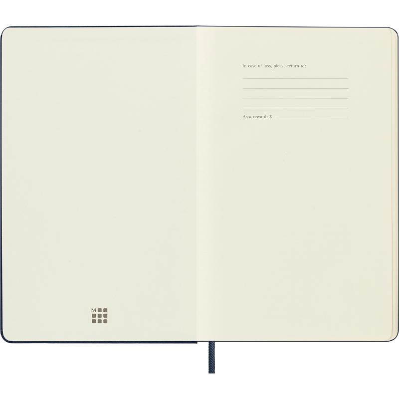 Large sapphire blue Moleskine notebook featuring a hard cover, plain ivory pages, elastic closure, and expandable inner pocket.