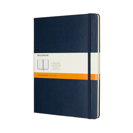 Moleskine XL Ruled Notebook in Sapphire Blue with hard cover, ivory pages, elastic closure, and expandable pocket.