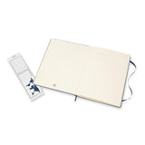 Sapphire blue Moleskine XL ruled notebook with premium ivory paper, elastic closure, bookmark, and expandable pocket.