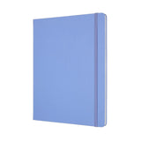 Moleskine XL notebook in Hydrangea Blue, featuring ruled pages, elastic closure, and expandable pocket for notes.