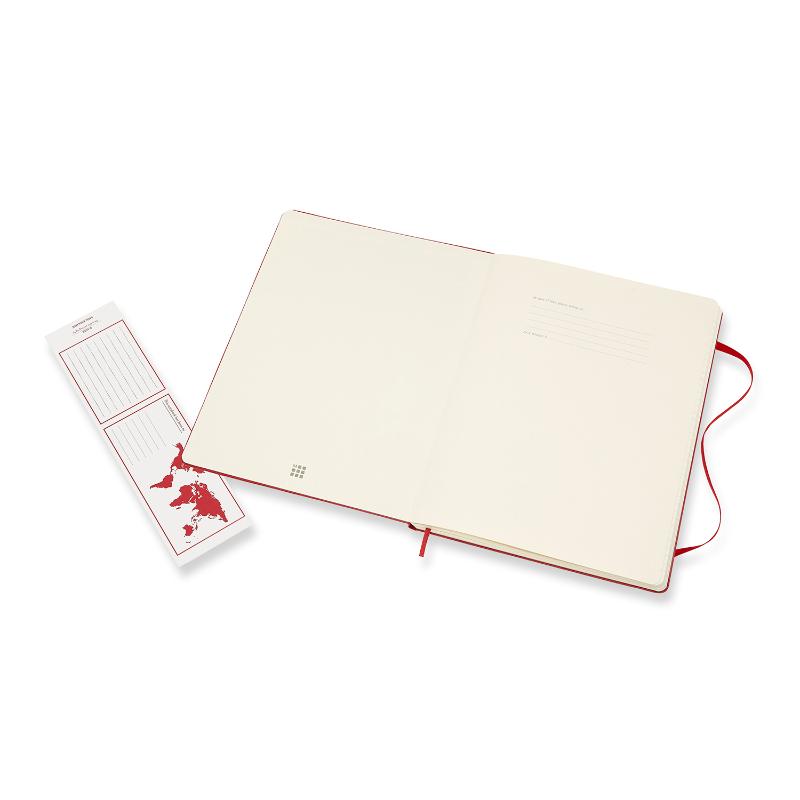 Moleskine XL notebook in scarlet red, featuring ruled ivory pages, elastic closure, bookmark, and expandable pocket for notes.