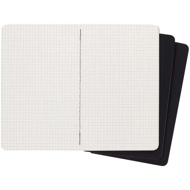 Three Moleskine Cahier Journals in large black with customizable covers, ideal for notes and sketches, featuring detachable pages.