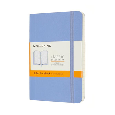 Hydrangea blue Moleskine notebook with ruled pages, elastic closure, and expandable pocket for notes and mementos.