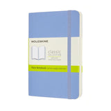 Moleskine Pocket Notebook in Hydrangea Blue with ivory pages, elastic closure, ribbon bookmark, and expandable pocket.