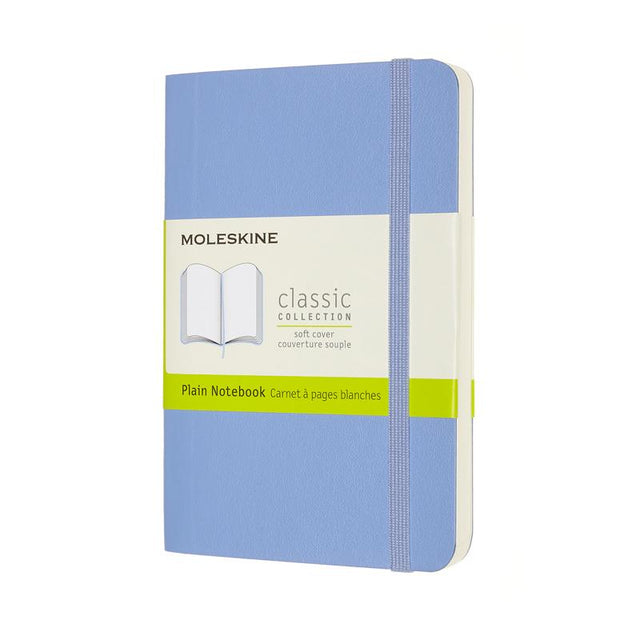 Moleskine Pocket Notebook in Hydrangea Blue with ivory pages, elastic closure, ribbon bookmark, and expandable pocket.