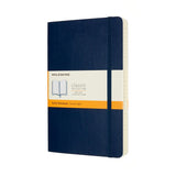 Moleskine Notebook in Sapphire Blue, 400 ruled pages, elastic closure, expandable pocket, and two bookmarks for organization.