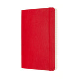 Large scarlet red Moleskine notebook with 400 ruled pages, two ribbon bookmarks, and elastic closure for creative writing.