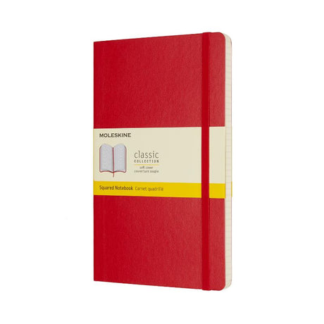 Scarlet red Moleskine notebook with soft cover, elastic closure, ivory pages, and expandable pocket for notes and mementos.