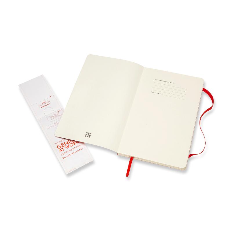 Scarlet red Moleskine notebook with soft cover, ivory pages, elastic closure, and expandable pocket for notes.