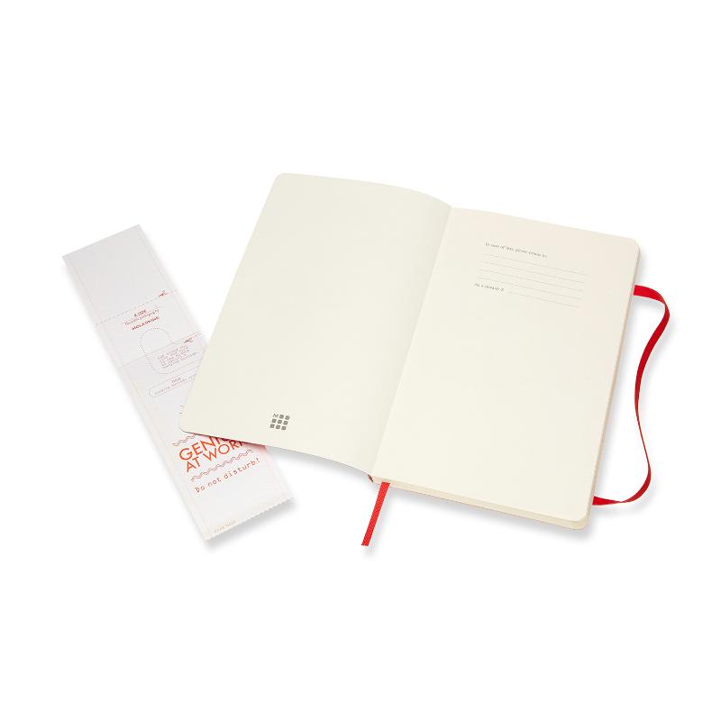 Scarlet red Moleskine notebook with soft cover, 180-degree opening, elastic closure, and expandable pocket for notes.