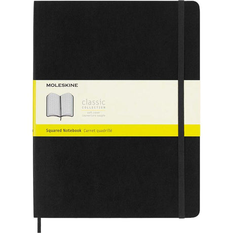 Moleskine XL black soft cover notebook with elastic closure, ivory pages, and expandable pocket for notes and sketches.