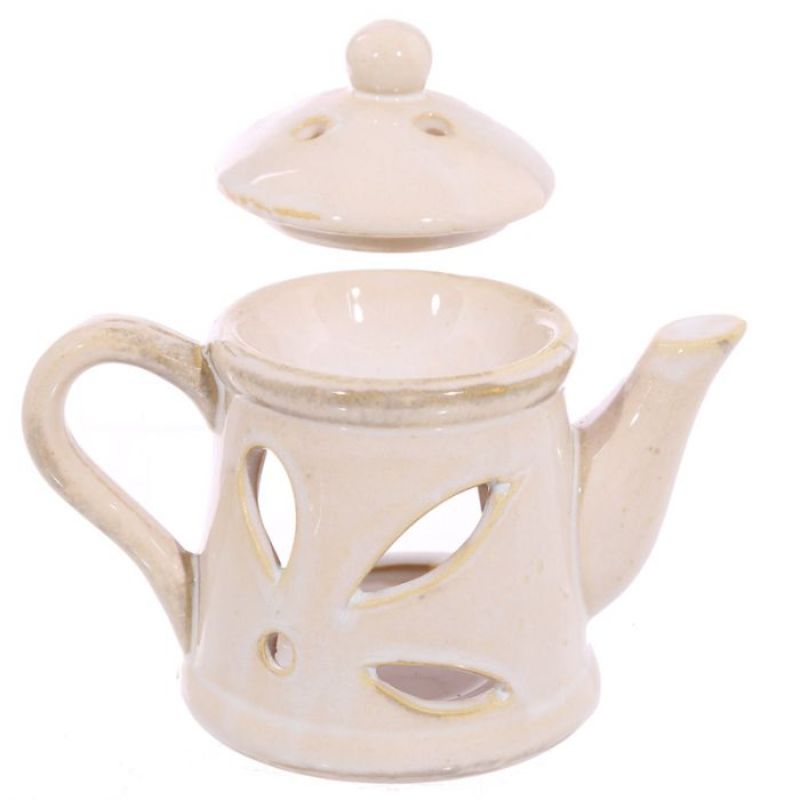 Ceramic teapot oil burners with lids in assorted designs, 12cm tall, for essential oils and creating a soothing ambiance.