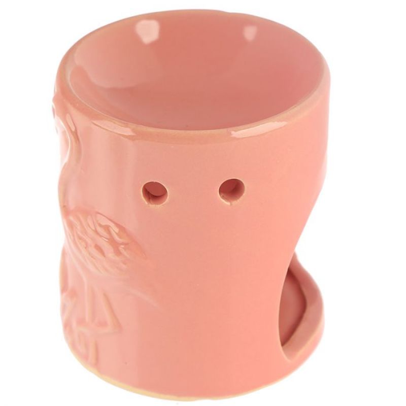 Ceramic oil burners featuring tropical pink flamingo designs, ideal for aromatherapy and decorative home accents.