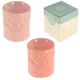 Set of 2 ceramic oil burners featuring pink flamingo designs, perfect for essential oils, adding tropical charm to any decor.