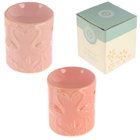 Set of 2 ceramic oil burners featuring pink flamingo designs, perfect for essential oils, adding tropical charm to any decor.