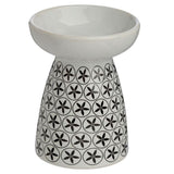 Ceramic oil and wax burners in Eden floral pattern, perfect for enhancing ambiance and fragrance in any room.