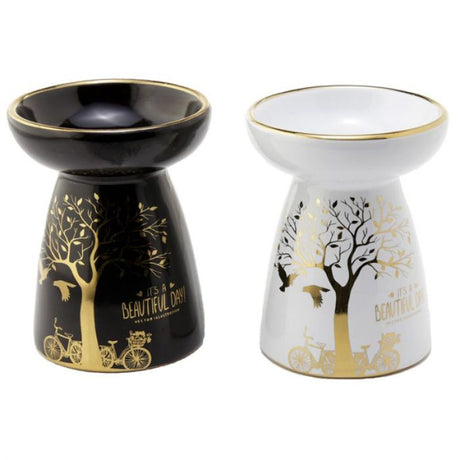 Ceramic Oil and Wax Burner set in metallic gold tree design for creating soothing aromas and enhancing home decor.