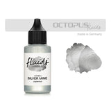 Metallic silver alcohol ink in a 30ml bottle for vibrant, smudge-proof artwork on various surfaces.