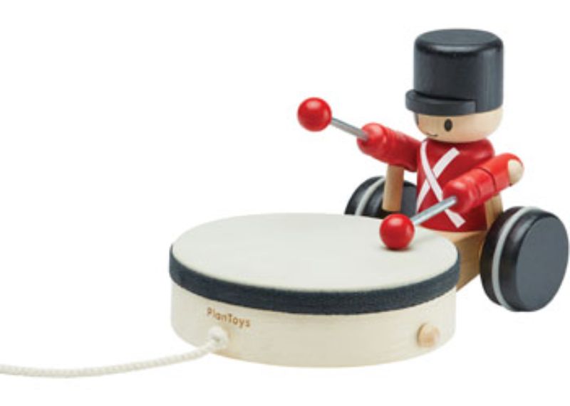 Colorful wooden pull-along drummer toy for toddlers, enhancing motor skills and encouraging musical creativity during play.