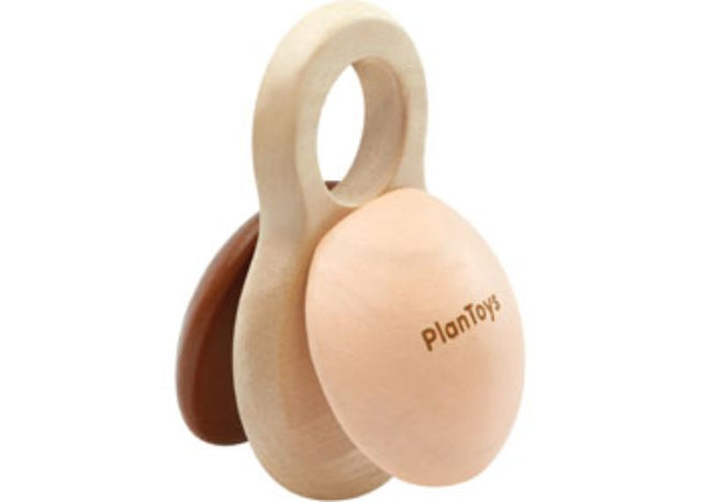 Colorful PlanToys Shake N Clap toy designed for toddlers, promoting rhythm, fine motor skills, and auditory development.