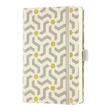 Castelli Oro Notebook with textured geometric design, ruled ivory pages, ribbon marker, and FSC-certified for sustainability.