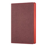 Pocket-sized Castelli Notebook in Maple Red with tweed cover, ruled ivory pages, ribbon marker, and FSC-certified paper.