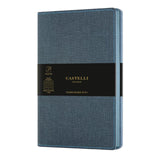 Castelli Notebook Harris in slate blue, featuring a flexible tweed cover, ruled ivory pages, and elegant ribbon marker.