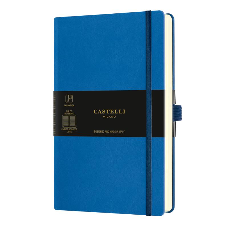 Stunning blue A5 ruled notebook with elastic band, ribbon marker, and expandable pocket for organized note-taking.