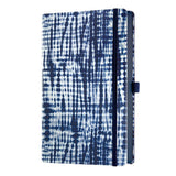 A5 notebook featuring elegant blue Shibori patterns, ruled ivory pages, and eco-friendly design with a pen loop and document pocket.