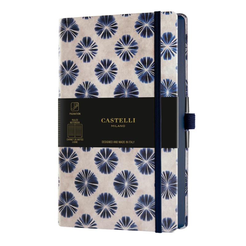 Elegant A5 ruled notebook featuring blue Shibori patterns, ivory pages, ribbon marker, and eco-friendly design.