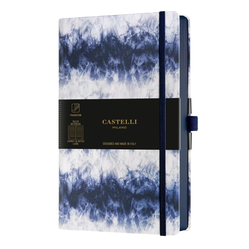 A5 ruled notebook with stunning Shibori blue patterns, featuring page numbering, index, and eco-friendly materials.