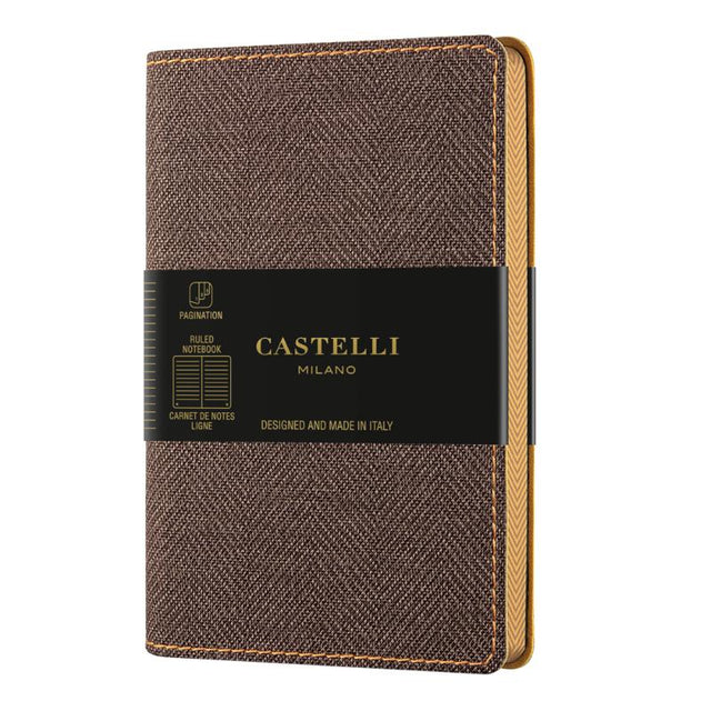 Elegant A5 ruled notebook in tobacco brown with tweed effect cover, ivory pages, and eco-friendly FSC certification.