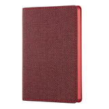 Elegant A5 ruled notebook in Maple Red with ivory pages, flexible cover, and coordinating ribbon marker, crafted in Italy.