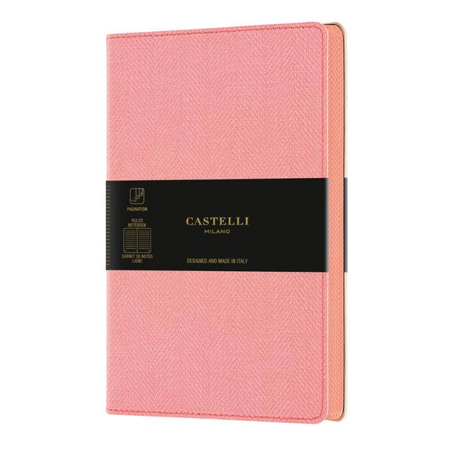 A5 ruled notebook in Petal Rose with tweed cover, ivory pages, page numbering, index, and a matching ribbon marker.