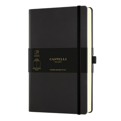 Stylish A5 black notebook with elastic closure, ribbon marker, and plain pages for notes and sketches, crafted in Italy.