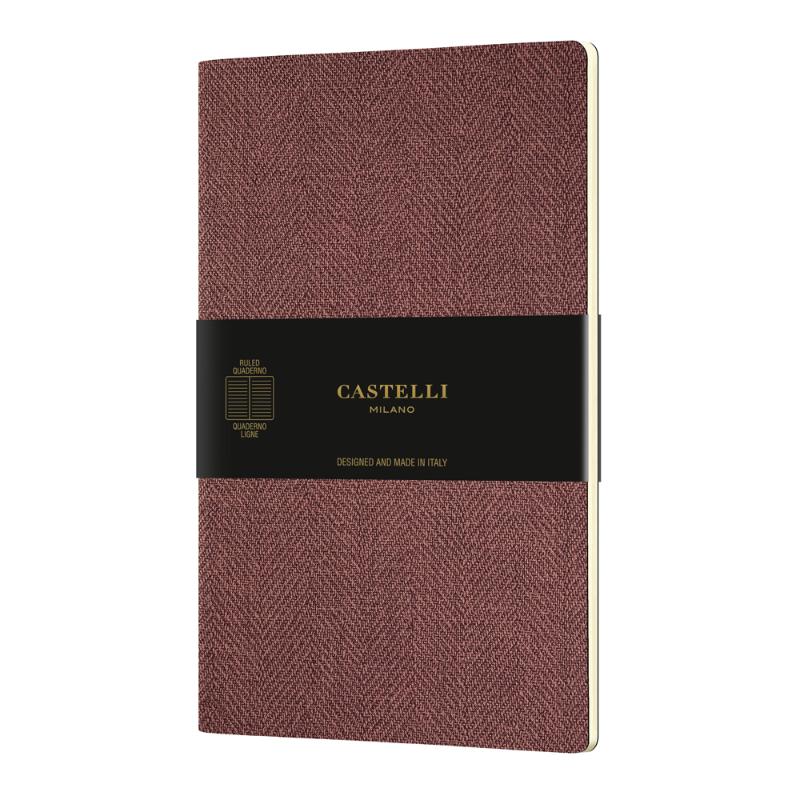 Castelli Quaderno A5 notebook in Harris Red, featuring soft cover, ivory ruled pages, and eco-friendly materials, made in Italy.