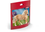 Detailed Haflinger Mare figurine with blonde mane and chestnut coat, ideal for play or as a decorative piece.