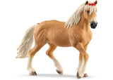 Detailed Haflinger Mare figurine with a blonde mane and chestnut coat, perfect for collectors and imaginative play.