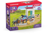 Schleich horse box set featuring a detailed mare and foal, perfect for imaginative play and animal care education.