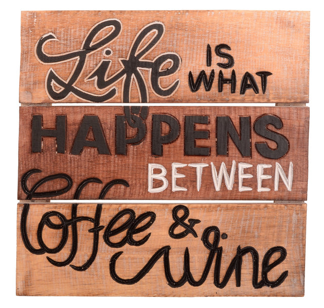 Hand-carved wood sign reading "Life is what happens between coffee and wine," perfect for home decor or as a quirky gift.