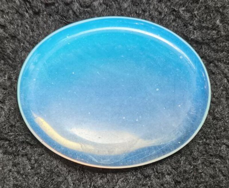 Opalite oval worry stone (4.5cm) for stress relief, featuring a smooth surface for calming anxious thoughts.