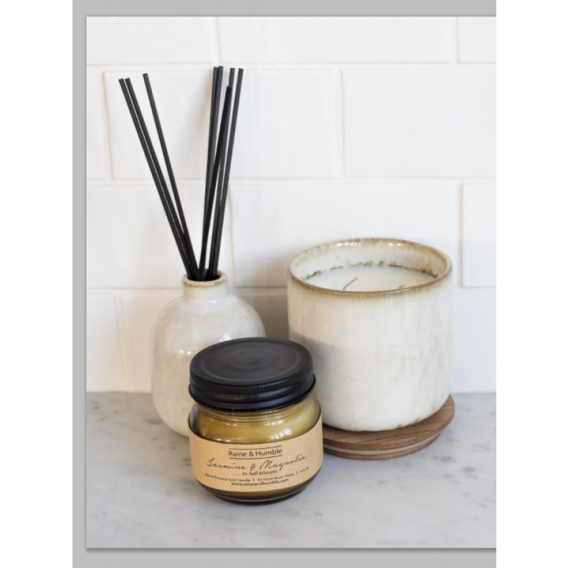 Hand-poured soy candle in heat-resistant glass, featuring sea salt and sage for a tranquil coastal aroma.