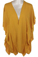 Mustard Victoria Ruffled Side Cape in viscose, draping elegantly, perfect for layering and stylish for all occasions.
