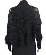 Sleek black Joanna Crochet Shrug crafted from premium cotton, featuring an intricate design for stylish layering.