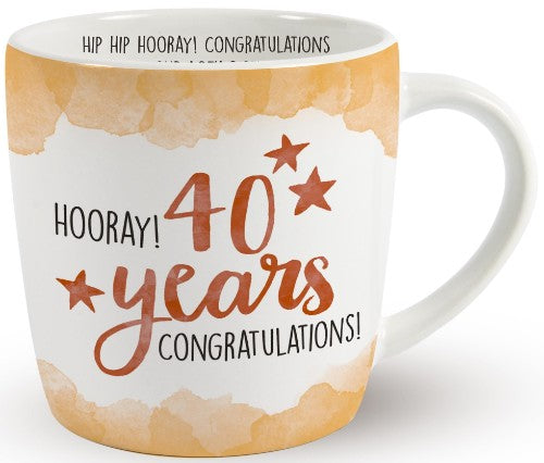 Ceramic mug celebrating 40 years, featuring hand-painted designs and heartfelt birthday congratulations.