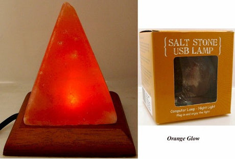 Orange Himalayan salt pyramid lamp, 10 cm tall, with a warm glow and sturdy brown base for wellness and decoration.