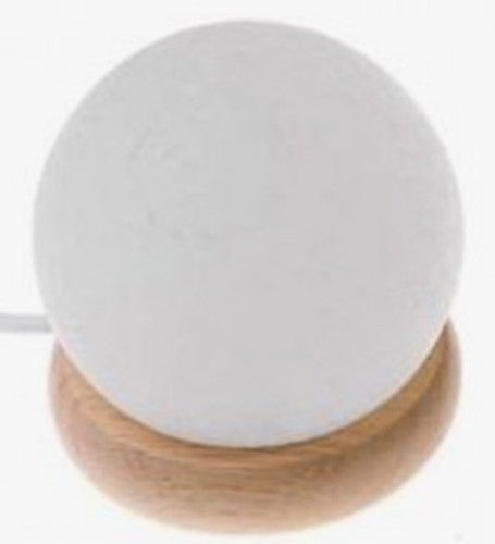 White spherical salt lamp with color-changing feature, promoting a calming ambiance and enhancing home decor.